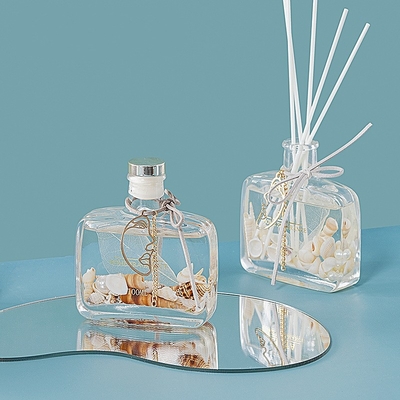 L'oceano unico del contenitore della copertura del contenitore di regalo delle bottiglie ha sentito l'olio Reed Diffuser di vetro