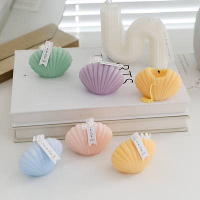 Gli ornamenti Shell Aromatherapy Soy Wax Creative del cubo dell'OEM dell'Istituto centrale di statistica della CASA dell'AROMA hanno sentito le candele per la decorazione domestica del regalo di compleanno