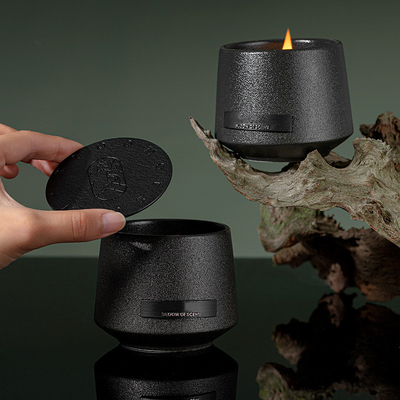 Porta-candela ceramici del nero della cera della soia della regione selvaggia della ciotola di stile di minimalismo con lo stoppino di legno