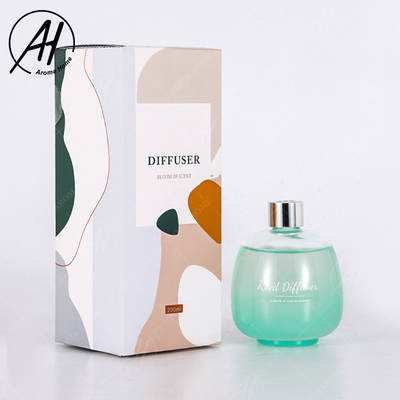 Bastone fresco Reed Diffuser Essential Oil Sets della fibra del coperchio del nastro della bottiglia di vetro della bolla di estate