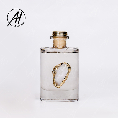 Aroma dorato Reed Diffuser 180ML dell'olio essenziale della bottiglia di vetro del coperchio del quadrato del rattan della fibra