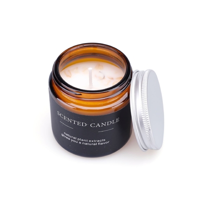 La candela profumata di lusso Velas di aromaterapia di vetro di Brown fiorisce il cristallo curativo