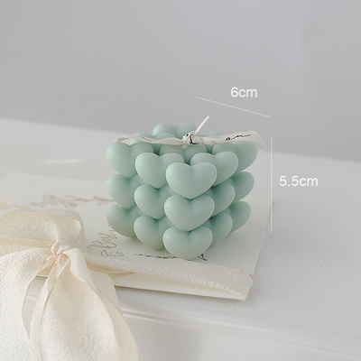 Il cubo di Rubik di amore del nuovo anno di DIY esamina in controluce il regalo geometrico profumato di aromaterapia